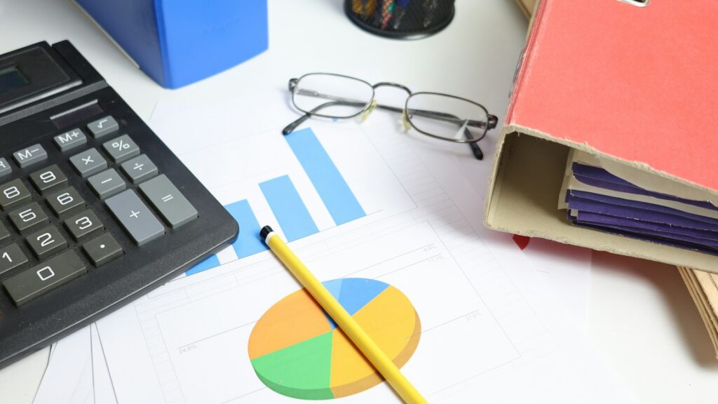 Mappen, grafieken en rekenmachine voor een foutloze boekhouding en gestructureerde administratie